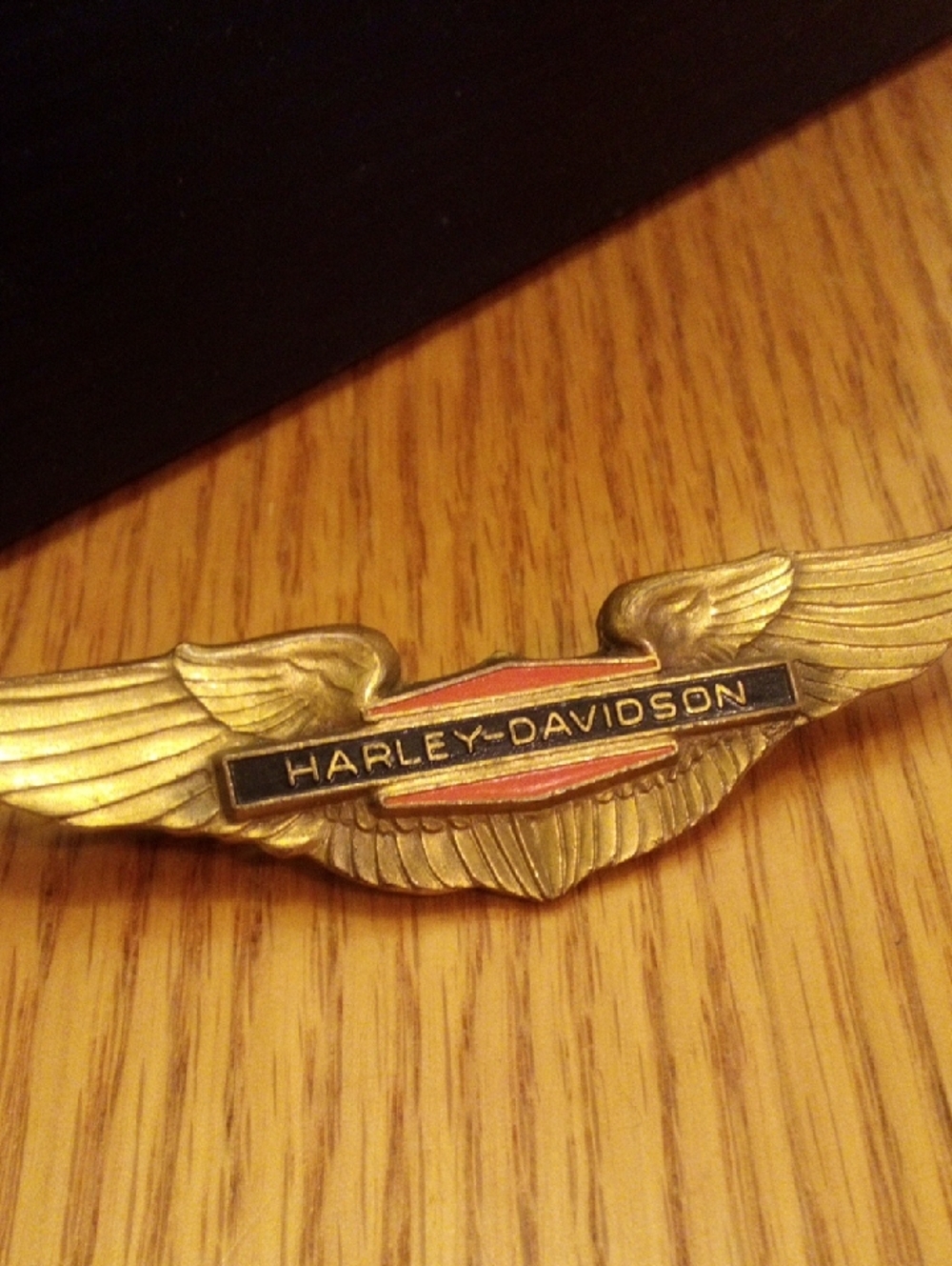 Harley-Davidson Gold Winged Logo Pin with Black and Red Accents